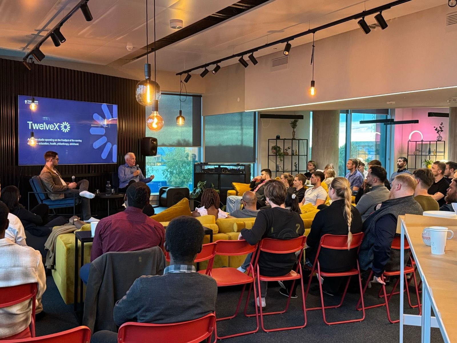 Packed room for a fireside chat at Tech & God